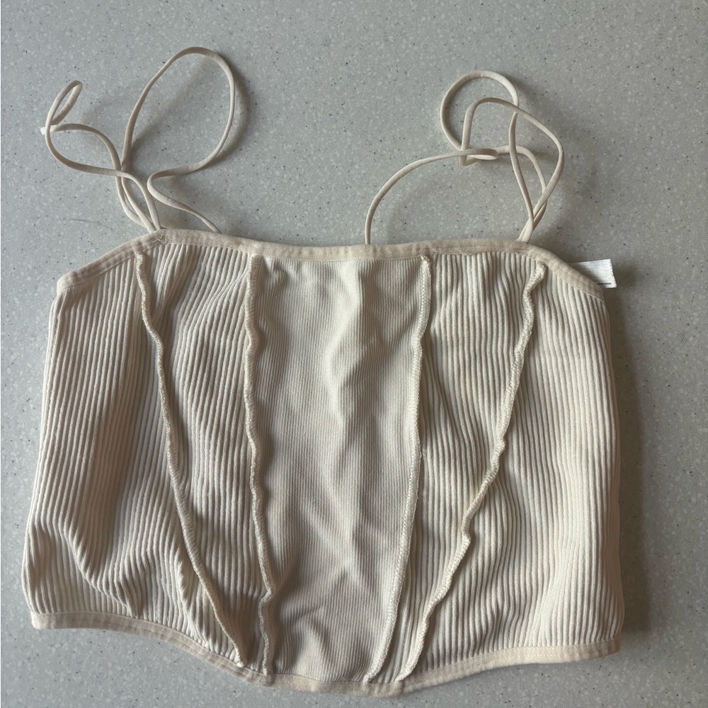 Urban Outfitters out from under top